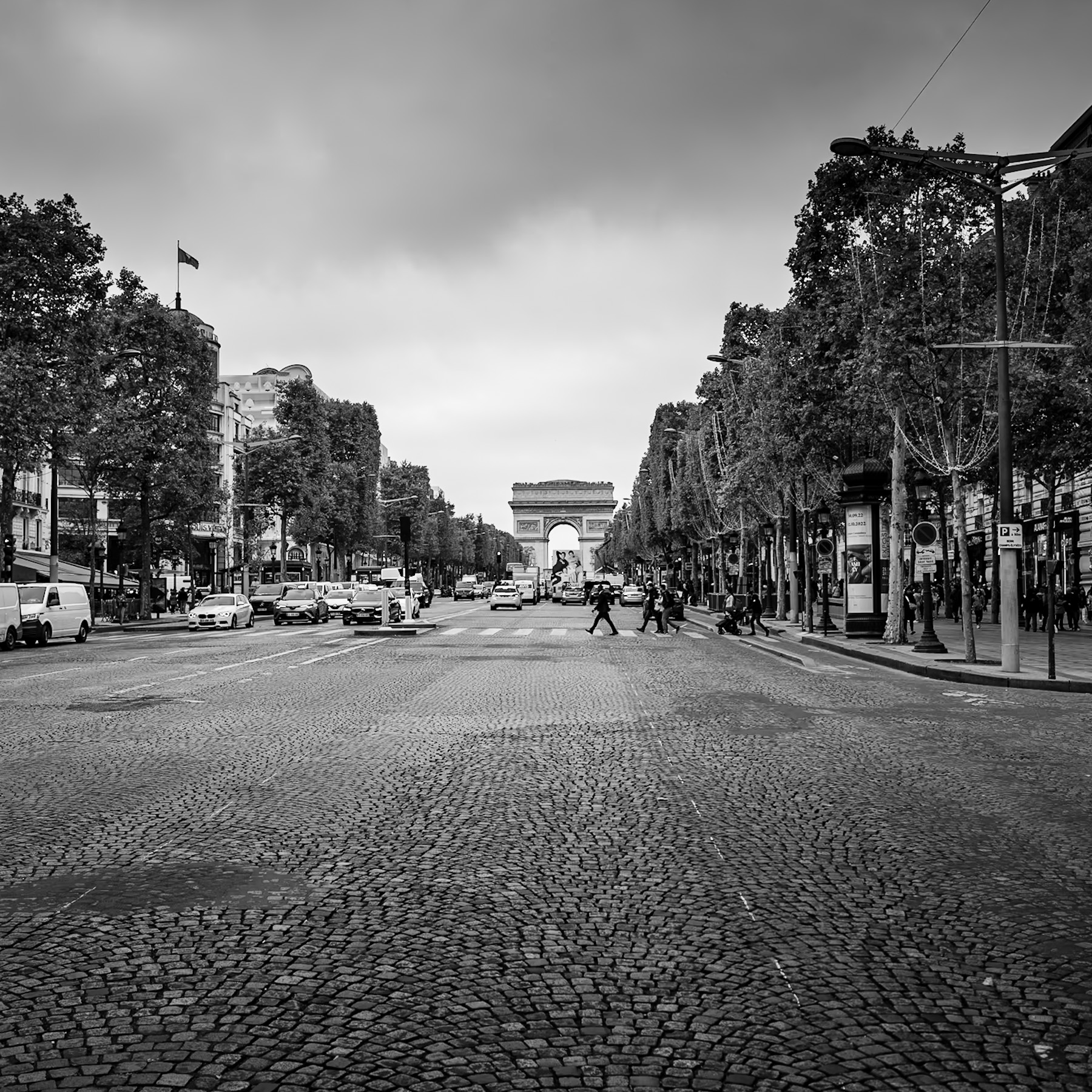 The Timeless Allure of the Champs-Élysées: A View Towards the Arc de Triomphe
