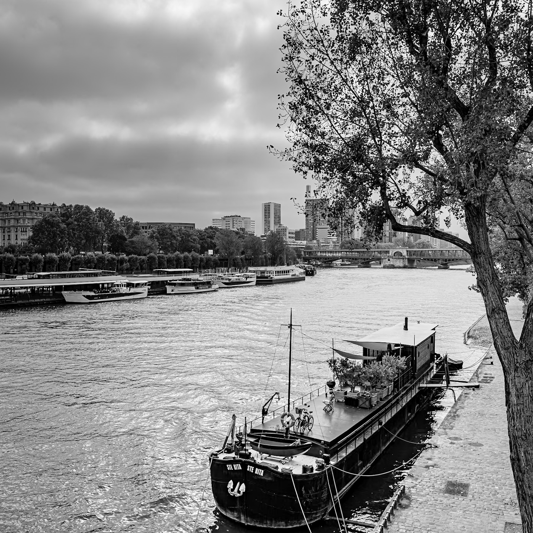 A Timeless Parisian Scene: Barges on the Seine