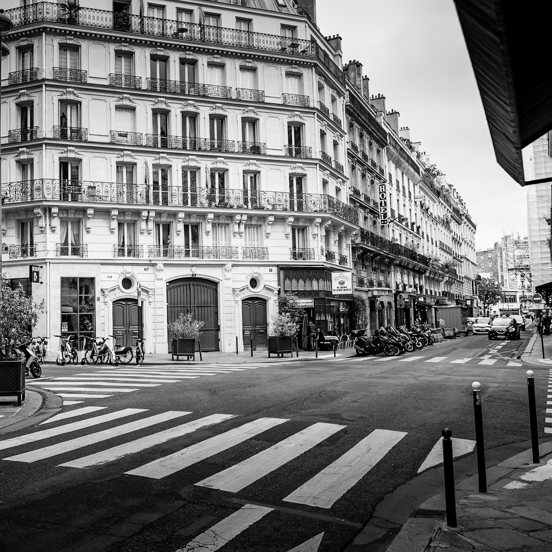 Parisian Streetscape: A Glimpse into Haussmannian Architecture and Urban Life